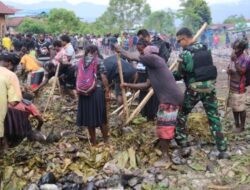Bakar Batu, Satgas Yonif R 514 Kostrad Bersama Masyarakat Merayakan Peresmian Gereja.