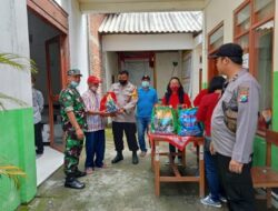 Polres Nganjuk Beri Layanan Kesehatan Gratis dan Bansos Menjelang Nataru